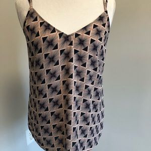 Trouvé top. Amazing patter. Gently used